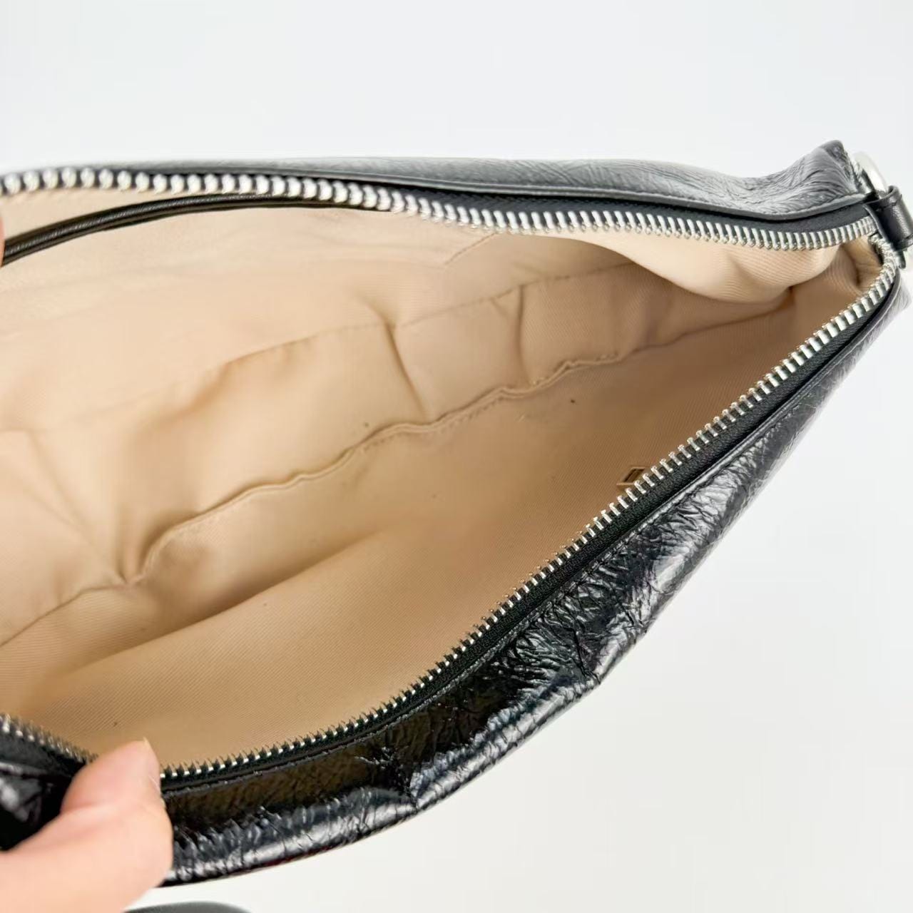 Anastasia Boutique Bags Black mini pouch bag case study