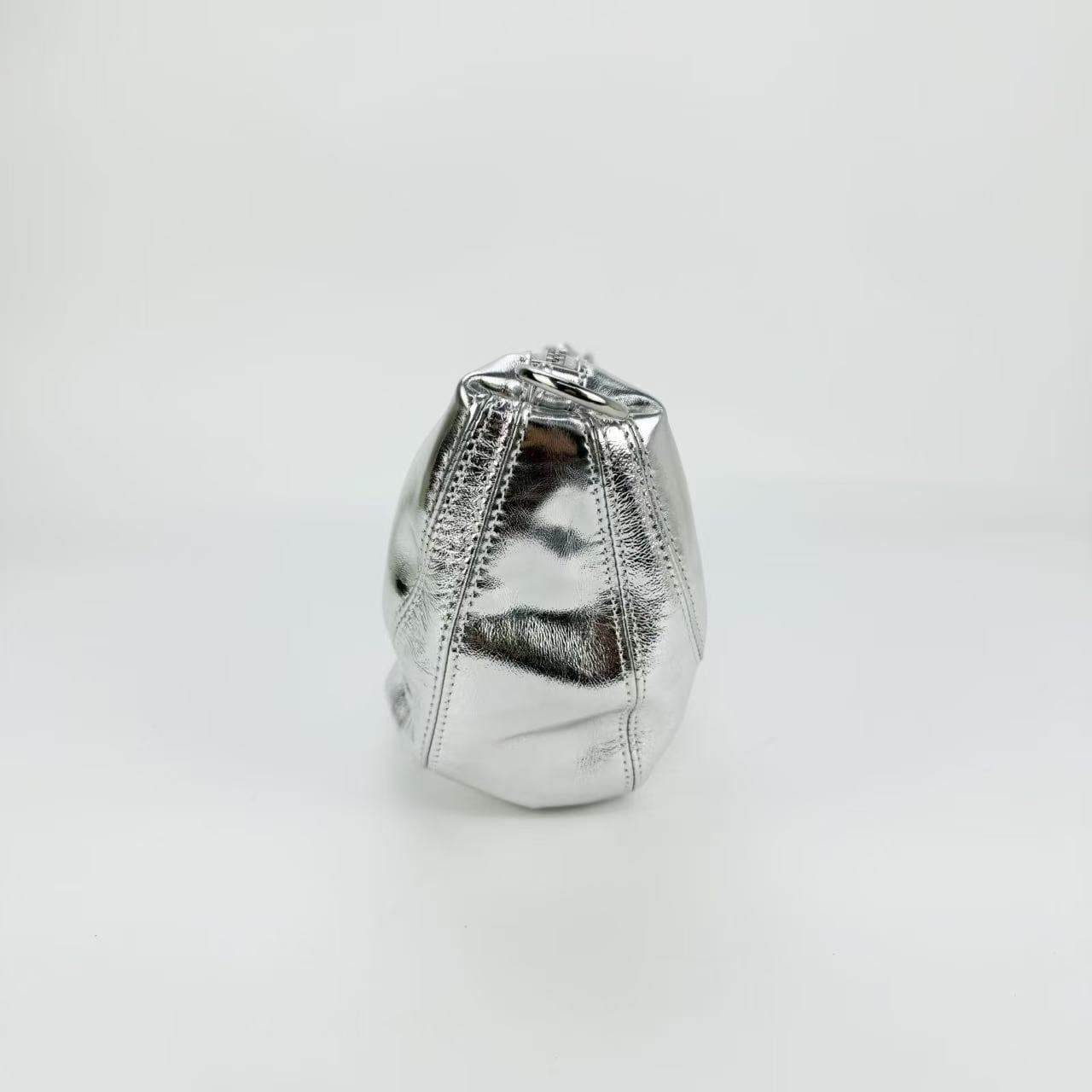 Anastasia Boutique Bags Silver mini pouch bag case study