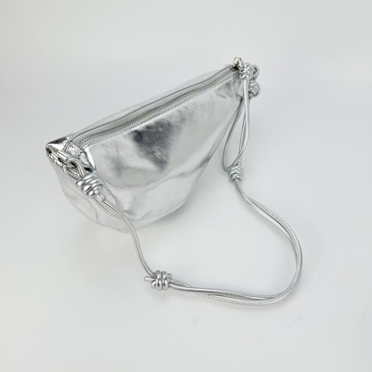 Anastasia Boutique Bags Silver mini pouch bag case study